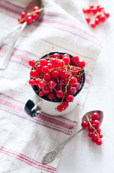red currants in a white enamel mug Stock photo © manera