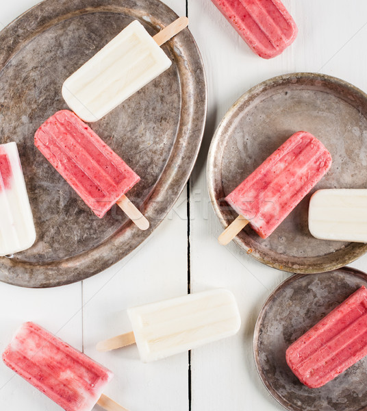 Creamy and strawberry popsicles Stock photo © manera