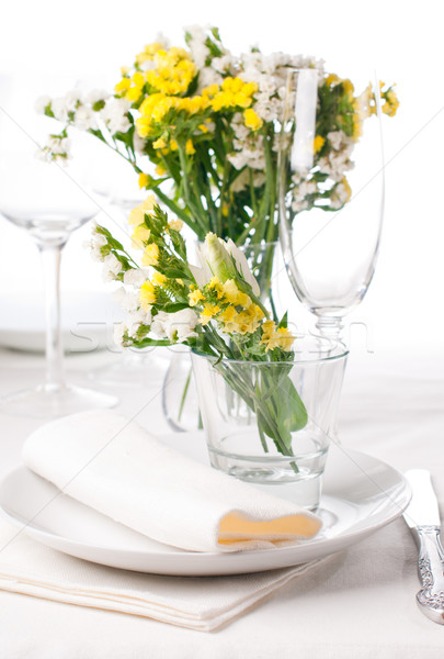 ünnepi asztal citromsárga dekoráció friss virágok Stock fotó © manera