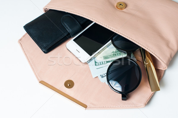 Open beige koppeling cosmetica zonnebril geld Stockfoto © manera