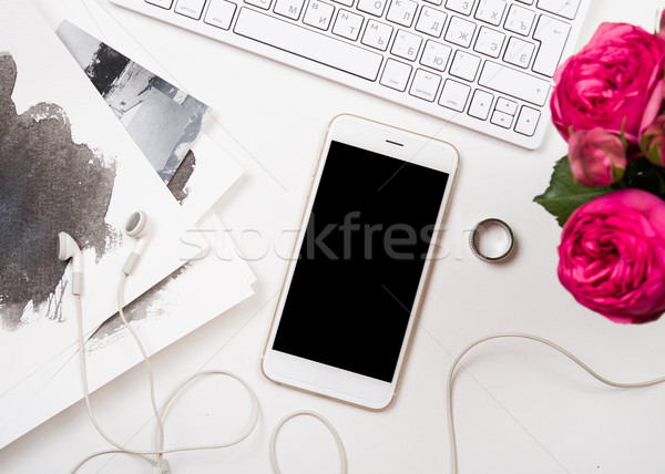 smartphone, computer keyboard and fesh pink flowers on white tab Stock photo © manera