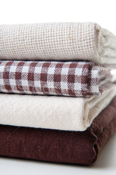 Stock photo: stack of new fabrics