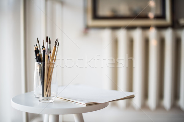 Stock photo: Creative artist's workspace, artistic paint brushes and paper