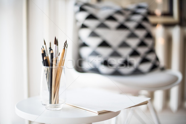 Creative artist's workspace, artistic paint brushes and paper Stock photo © manera