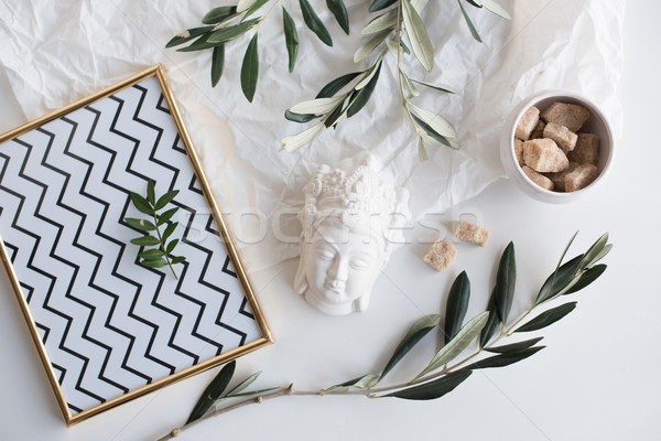 Stock photo: Olive branches and ceramic decor