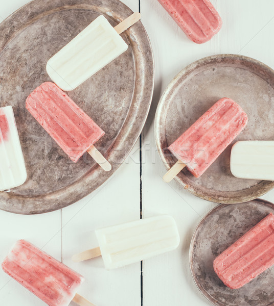 Creamy and strawberry popsicles Stock photo © manera