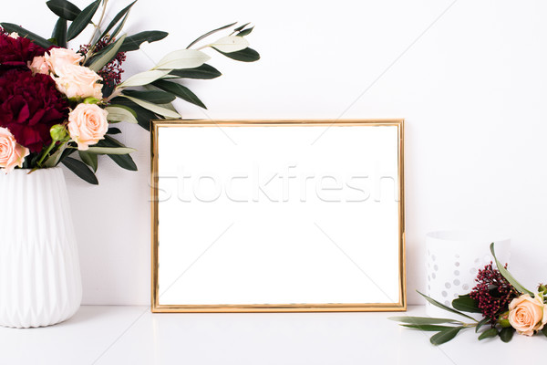 Golden frame mock-up on white wall Stock photo © manera