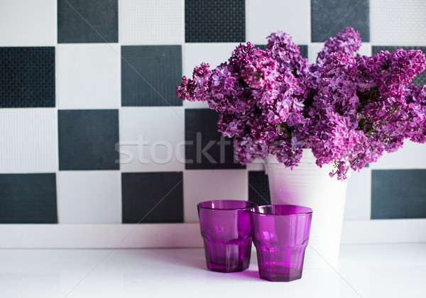 lilacs in a vase and glasses Stock photo © manera