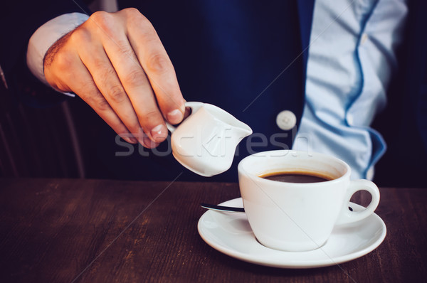 cream into coffee Stock photo © manera