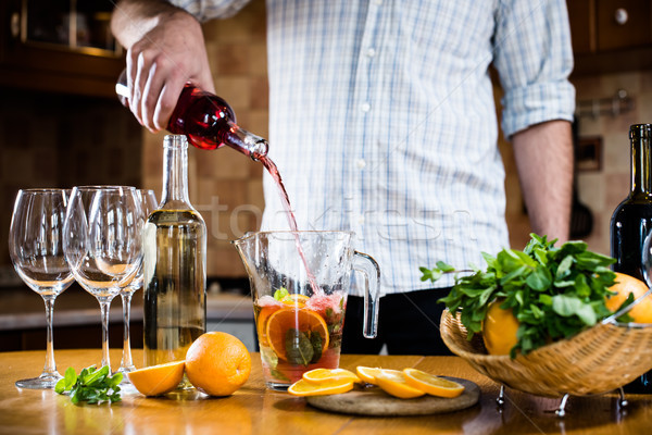 pouring red wine into a carafe Stock photo © manera