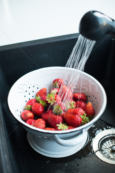 Stock photo: organic strawberries in colander