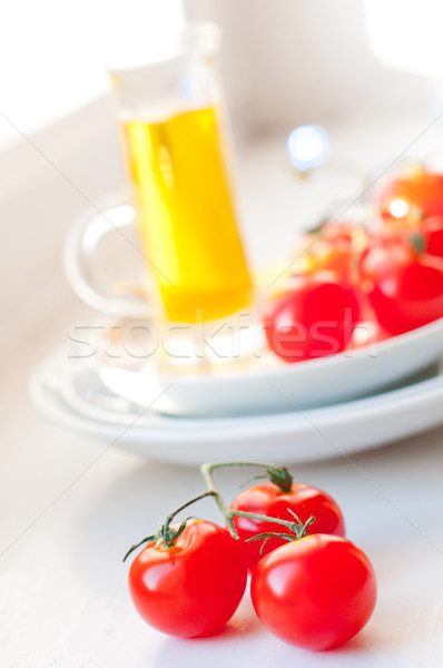 Tomates cereja azeite brilhante luz solar sol fundo Foto stock © manera