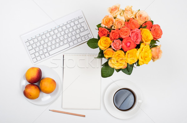 Stock photo: Feminine white desk workspace with flowers, startup concept