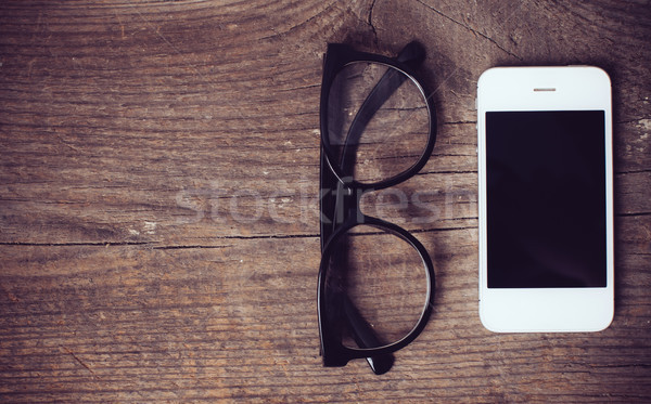 Okostelefon olvasószemüveg öreg fa deszka hipszter stílus Stock fotó © manera