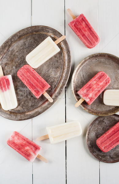 Creamy and strawberry popsicles Stock photo © manera