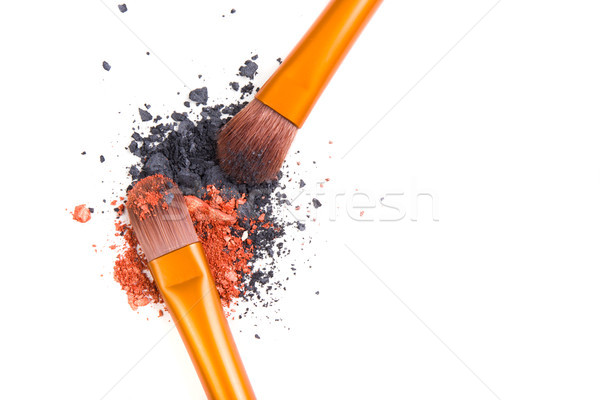 Professional makeup brushes set and loose powder eyeshadows isol Stock photo © manera