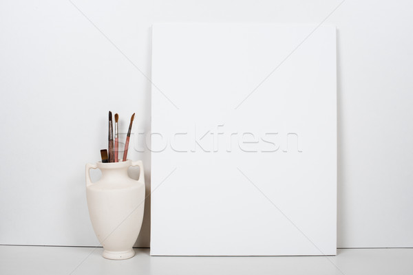 Empty blank canvas on a white background, home interior decor Stock photo © manera