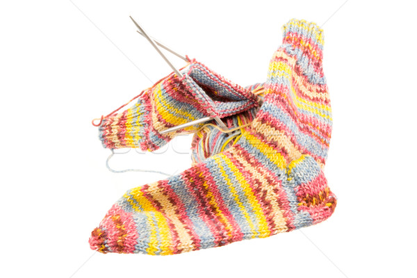 Stock photo: Isolated woolen socks with knitting equipment