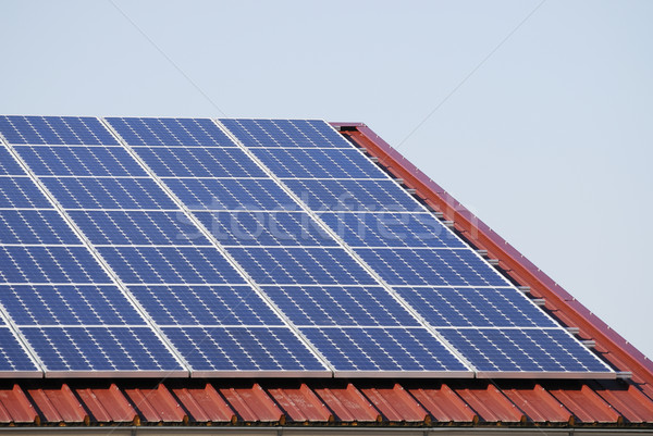 Fotovoltaikus alternatív energia generáció ház épület Stock fotó © manfredxy