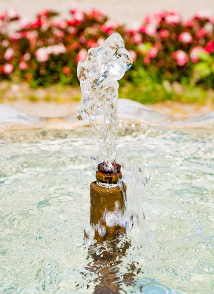 Water flwoing out of a fountain Stock photo © manfredxy