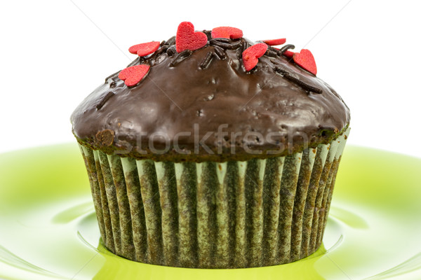 Stock photo: Isolated chocolate muffin on a green plate