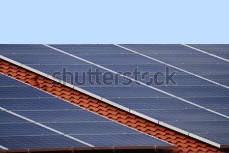 Fotovoltaikus innovatív installáció tető ház épület Stock fotó © manfredxy