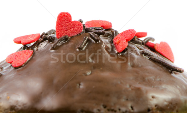 Isolated chocolate muffin with red sugar hearts Stock photo © manfredxy