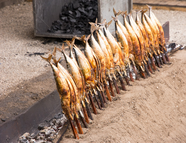 Grilling fish on a stick Stock photo © manfredxy