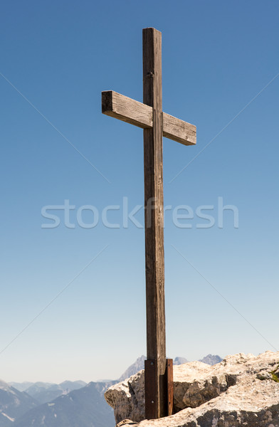 Stock photo: Wooden summit cross in the alps