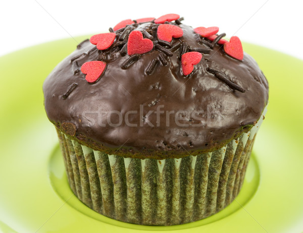 Isolated chocolate muffin on a green plate Stock photo © manfredxy