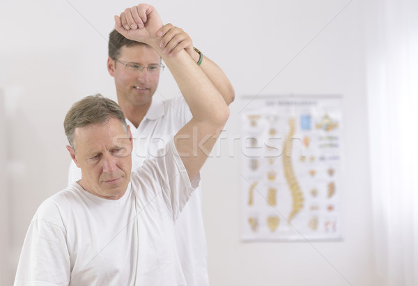Fizioterapie senior om sportiv sport exercita Imagine de stoc © mangostock
