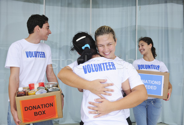 счастливым группа продовольствие пожертвование коробки Сток-фото © mangostock