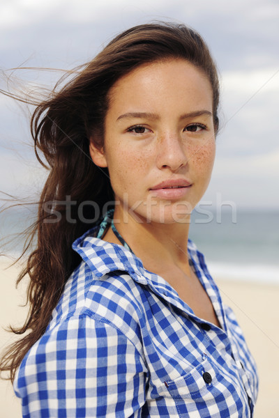 portait of a beautiful woman by the beach Stock photo © mangostock