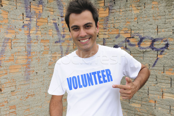 happy male volunteer Stock photo © mangostock
