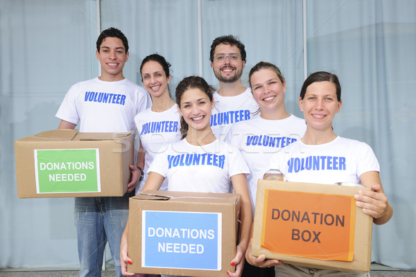 Stock photo: volunteer group with food donation 