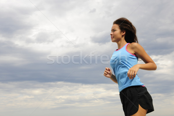 woman running on the beach Stock photo © mangostock
