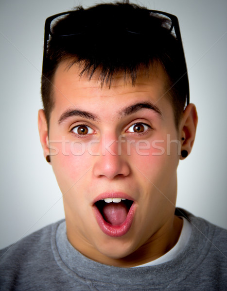Teenager Porträt junger Mann Gläser Lächeln Gesicht Stock foto © Marcogovel