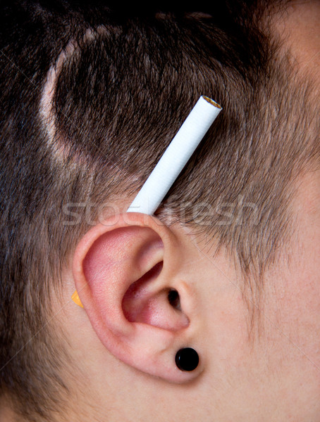 Ouvido cigarro cicatriz branco pessoa humanismo Foto stock © Marcogovel