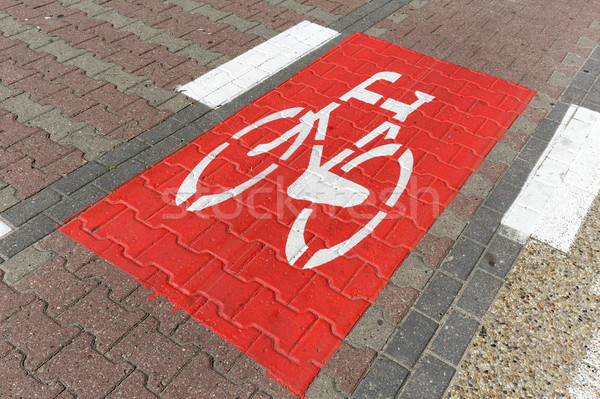 Bike lane sign it is marked on the road Stock photo © marekusz