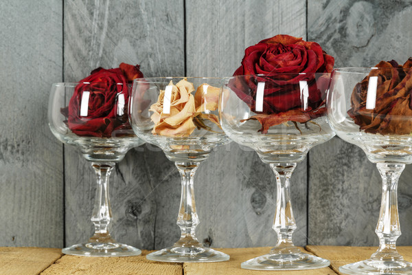 Stock photo: Glasses with roses symbolize wine