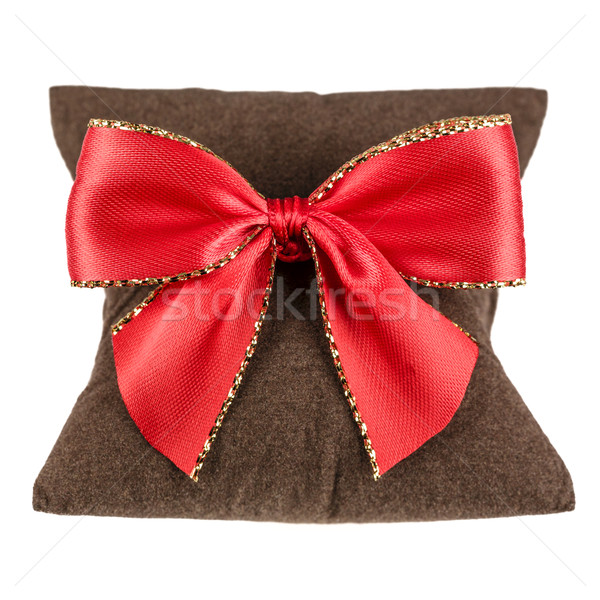 Soft pillow and decorative bow on Stock photo © marekusz