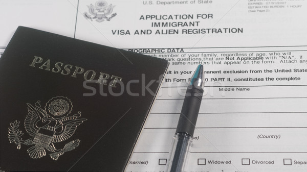 Stock photo: Application for immigrant visa form and US passport