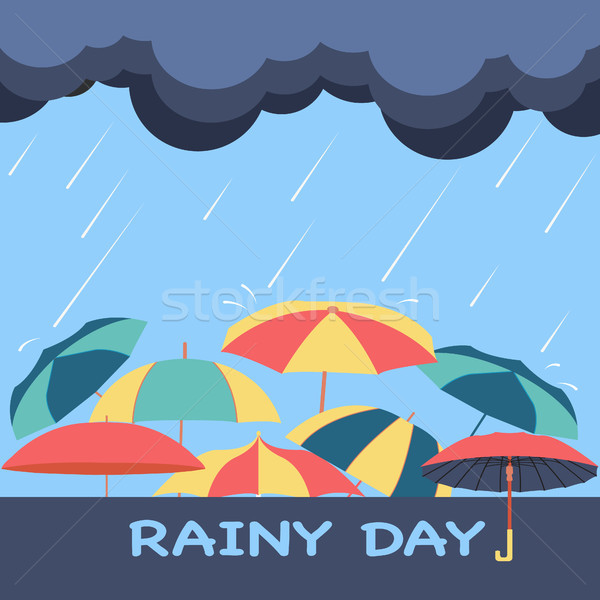 Rainy season background with clouds, raindrops and umbrellas Stock photo © Margolana