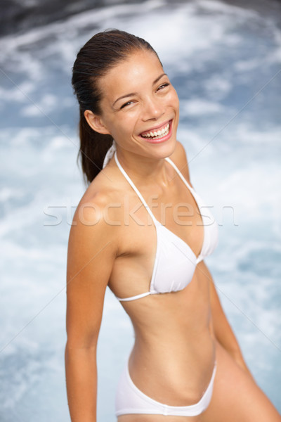 Bikini woman happy getting out of water Stock photo © Maridav