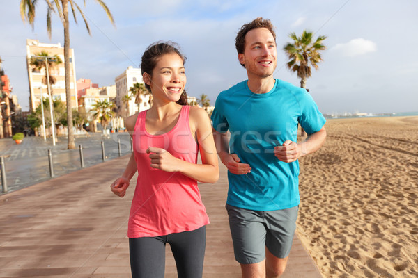 Esecuzione Coppia jogging Barcellona spiaggia Foto d'archivio © Maridav