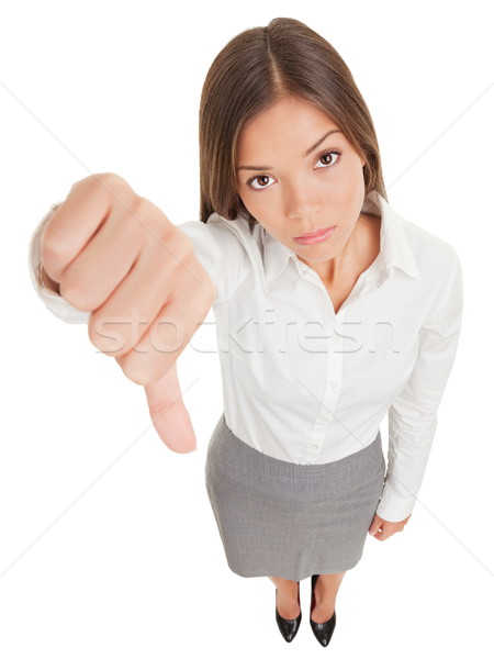 Sad business woman making a thumbs down sign Stock photo © Maridav