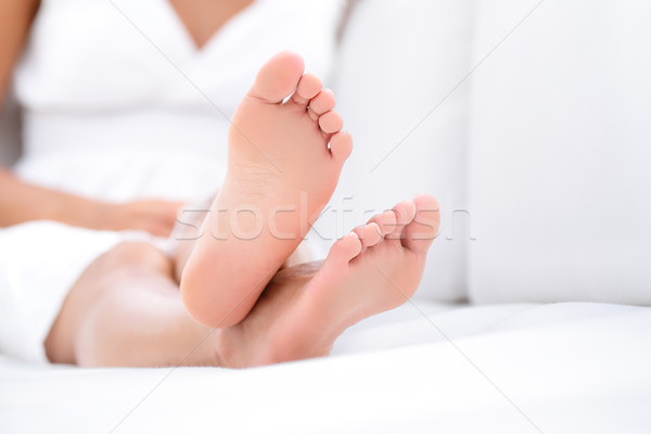 Nő láb közelkép mezítláb megnyugtató kanapé Stock fotó © Maridav