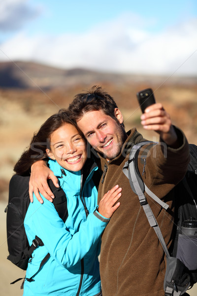 Stock photo: Happy young couple outdoors hiking