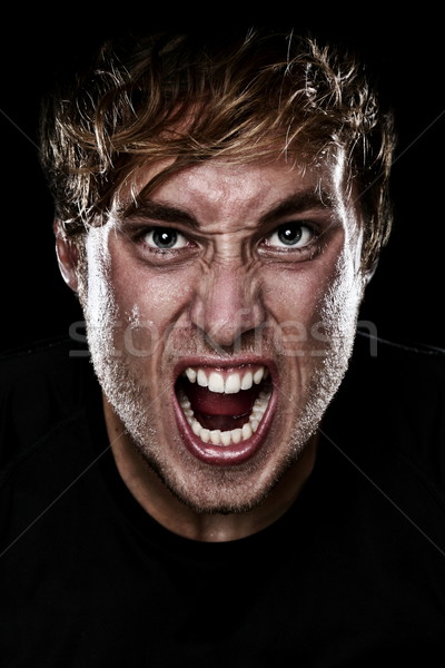 Enojado hombre gritando agresivo cámara negro Foto stock © Maridav