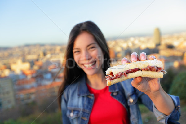 Jamon Iberico Sandwich - woman eating in Barcelona Stock photo © Maridav